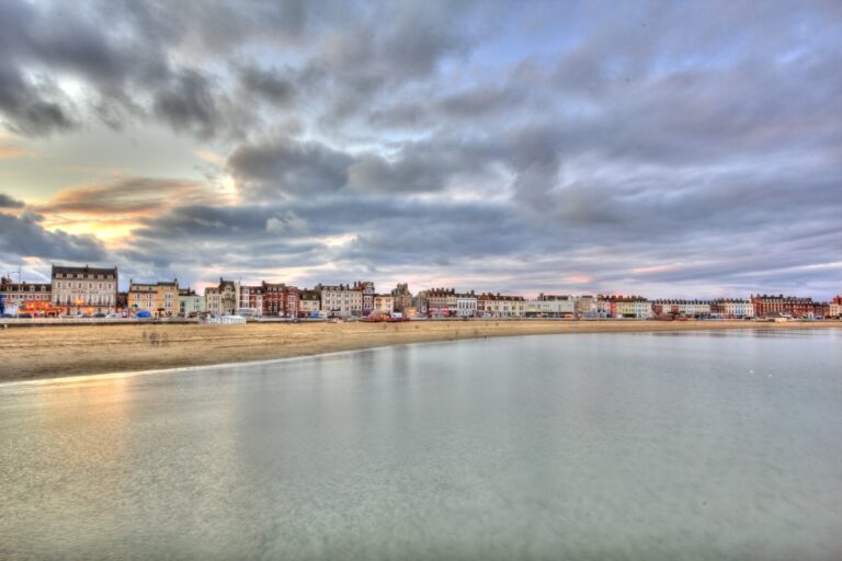 Weymouth Beach at sunset in the concept of parks and green spaces in Weymouth.