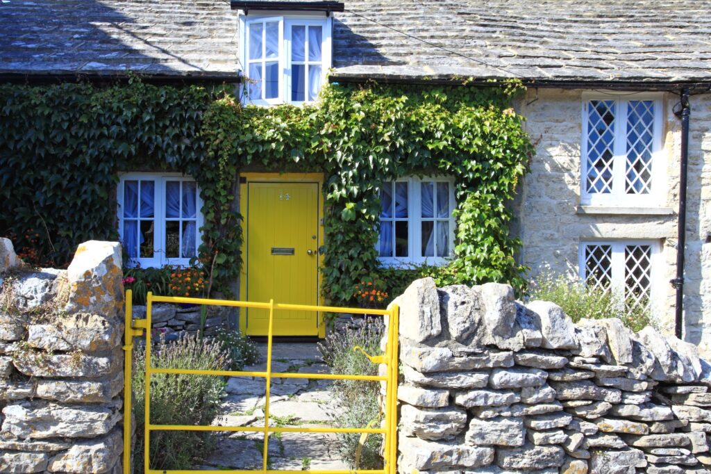 In front of a traditional British cottage